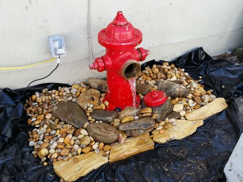 This is the Fire Hydrant Water feature I built(with help) ! Fountain Decor, Pond Decor, Firefighter Home Decor, Pondless Waterfall, Fire Hydrants, Firefighter Decor, Fire Life, Water Falls, Ponds Backyard