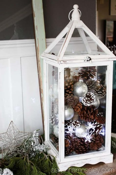 Lantern Filled With Ornaments, Decorate Laterns For Christmas, White Lantern Wedding, Lantern Christmas Decor Ideas, Pine Ornaments, Christmas Latern, Christmas Lantern Decor, Lantern Decor Ideas, Christmas Lantern Decor Ideas