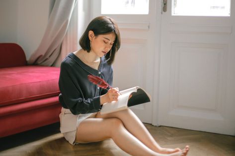 Asian woman writing a diary Premium Phot... | Premium Photo #Freepik #photo #people Writing In Notebook Pose, Writing Pose Reference, Writing Pose, Fantasy Cafe, Writing A Diary, Woman Writing, Life Reference, People References, Smart Casual Wear