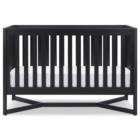 Designed to be the centerpiece of your nursery, the Tribeca 4-in-1 Convertible Crib by Delta Children exudes contemporary cool. Designed to be the centerpiece of your nursery, the Tribeca 4-in-1 Convertible Crib by Delta Children exudes contemporary cool. Featuring plenty of modern touches it boasts a sleek x-shaped base and airy slats Crafted from strong and sturdy wood, this crib features three height levels, and converts to a toddler bed, daybed and full size bed, making it the only bed your Library Basement, Full Size Metal Bed Frame, Boys Room Inspiration, Baby Boy Room Ideas, Black Crib, Metal Baby, Baby Cribs Convertible, Goth Baby, Boy Room Ideas