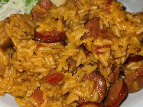 A box of Zatarain's jambalaya mix is combined with andouille sausage, onion, and a can of diced tomatoes with green chile peppers for fantastic results. Zatarains Jambalaya Add Ins, Zatarans Jambalaya, Zatarains Jambalaya, Chicken Jambalaya Recipe, Jambalaya Rice, Chicken Jambalaya, Jambalaya Recipe Easy, Cajun Jambalaya, Chicken And Rice Dishes