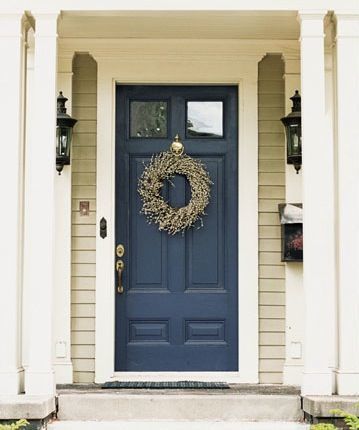 Navy blue front door on a tan house with white trim. Pretty! Navy Front Door, Exterior Paint Color Schemes, Tan House, Blue Front Door, Door Paint Colors, Exterior Paint Color, Paint Color Schemes, Painted Front Doors, Front Door Colors