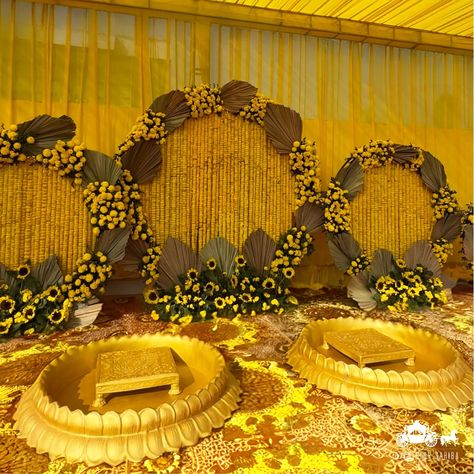 This intimate haldi ceremony decor showcased the timeless beauty of marigold & sunflowers, creating a vibrant and festive backdrop for this joyous occasion. The rich, golden hues of the marigolds brought an air of warmth and celebration, perfectly capturing the essence of this traditional Indian ritual. Each carefully arranged flower not only added a touch of elegance but also embodied the blessings and love surrounding the couple. Our team meticulously crafted the decor to ensure every detai... Simple Backdrop Decorations, Haldi Decorations, Festive Backdrop, Haldi Decoration Ideas, Haldi Ceremony Decorations, Haldi Decoration, Reception Stage, Reception Stage Decor, Haldi Decor