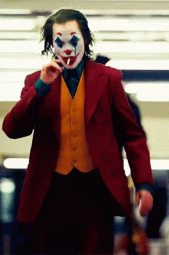 Joker Smoking GIF - Joker Smoking Joaquin Phoenix - Discover & Share GIFs Joaquin Phoenix, Animated Gif, Phoenix, Gif, Makeup, Red, Make Up