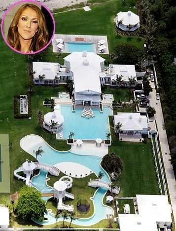 The $12.5 million mansion that Dion shares with husband Rene Angelil in Jupiter Island, Fla., has a water park any kid would envy. The backyard boasts a twisty water slide, two Olympic-sized pools and a lazy river. #Cake Celebrity Mansions, House Florida, Luxury Swimming Pools, Amazing Homes, Dream Mansion, Lazy River, Hollywood Homes, Rich Home, Million Dollar Homes