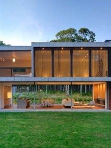 Sensational coastal retreat in Sagaponack | One Kindesign Plastic Bottle House, Contemporary Lake House, Shipping Container Home Designs, Bottle House, Tiny House Community, Container House Plans, Casa Container, Shipping Container House, House Furniture Design