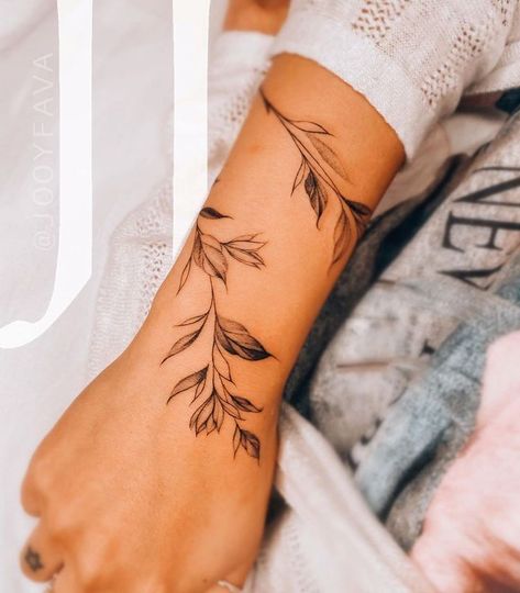 240+ Vine Tattoos For Guys and Females (2022) - TattoosBoyGirl Wrap Around Wrist Tattoos, Stylish Tattoo, Vine Tattoos, Forearm Tattoo Women, Stylist Tattoos, Classy Tattoos, Dainty Tattoos, Feminine Tattoos, Simplistic Tattoos