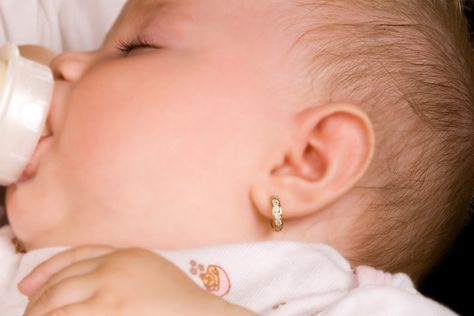 9 Important Things You Should Know About Baby Ear Piercing Baby With Earrings, Infant Ear Piercing, Gold Earrings For Kids Baby, Baby Earrings Infants, Earrings For Baby Girl, Baby Ear Piercing, Gold Earrings For Kids, Grandmother Jewelry, Ears Pierced