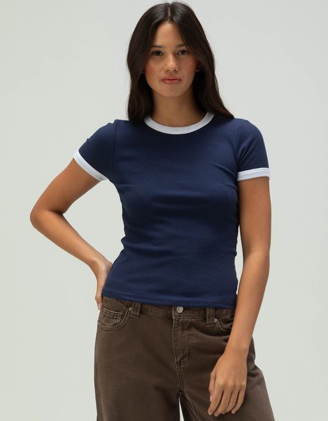 Tilly's Ringer Tee. Featuring A Ribbed Texture And Contrasting Trim On The Neckline And Short Sleeves, It Offers A Snug, Flattering Fit. Crewneck. Crafted With Soft And Breathable Fabric. 60% Cotton, 35% Polyester, 5% Spandex. Machine Wash. Imported.model Is Wearing A Size Small. Model Measurements:height: 5'7" Bust: 32abwaist: 23"hips: 34" | Tillys Ringer Tee Tillys Outfits, Womens Low Rise Jeans, Overalls Boys, Chino Pants Women, Womens Jeans Bootcut, Contrasting Trim, Girls Graphic Tee, Flannel Jacket, Girls Blouse