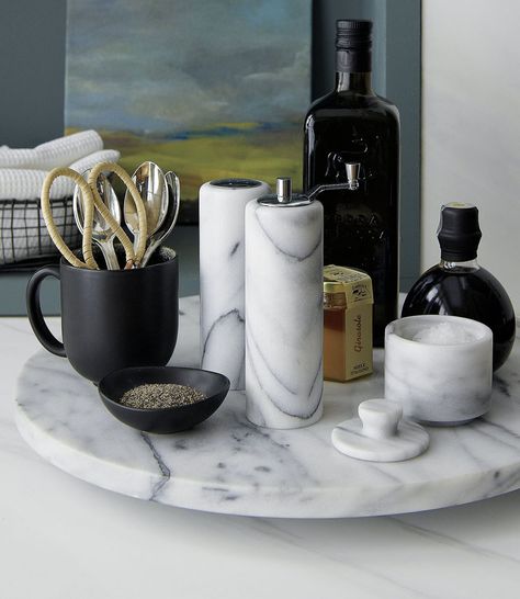 Put your salt and pepper into marble shakers and keep them on a lazy suzan or tray to create the ultimate marble kitchen table centerpiece. Marble Lazy Susan, Kitchen Table Centerpiece, Kitchen Decor Apartment, Kitchen Counter Decor, Counter Decor, Marble Tray, French Kitchen, Salt Cellar, Kitchen Marble