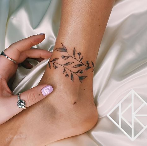 Elegant Vine Ankle Tattoos Ankle Tattoo Women Small, Vine Ankle Wrap Tattoo, Simple Feet Tattoos For Women, Anklet Flower Tattoos For Women, Leaf Ankle Tattoo Wrap, Vine Wrap Around Ankle Tattoo, Ankle Wrapped Tattoo, Leaves Wrapped Around Ankle Tattoo, Vines Around Ankle Tattoo