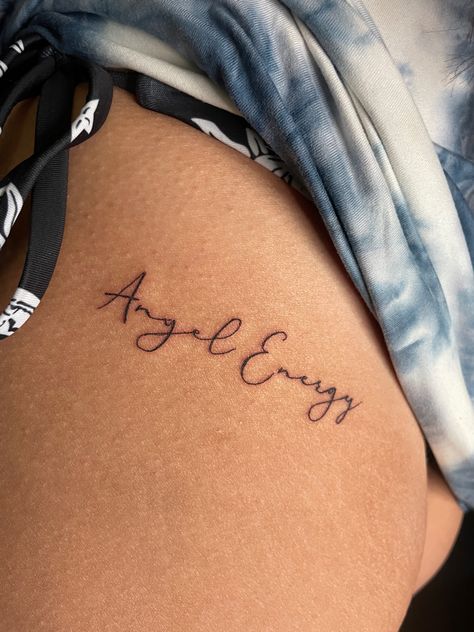 Small tattoos Fine Line Tattoo Angel Number, Aura Tattoo Design, Dainty Angel Number Tattoos, Angel Energy Tattoo Cursive, Angel Energy Tattoo, Angel Quote Tattoo, Aura Tattoos, Cursive Tattoos, Spiritual Tattoos