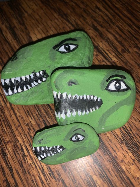 Some fun dino rocks. Check out my other art on my blog’s art page. Dinosaur Rocks Painting, Dino Rock Painting, Painted Rocks Dinosaur, Dinosaurs Painted On Rocks, Dinosaur Painted Rocks Ideas, Dinosaur Rock Painting, Dinosaur Rocks, Dinosaur Rock, Rock Pets