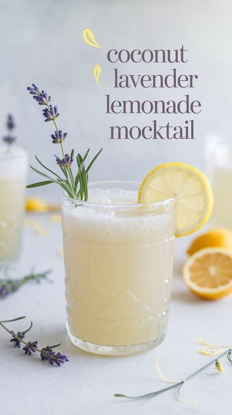 "Discover the perfect summer refreshment with this Coconut Lavender Lemonade Mocktail Recipe! This delightful non-alcoholic beverage combines the tropical flavors of coconut with the soothing essence of lavender, creating a refreshing mocktail that's ideal for hot days. Enjoy this easy-to-make lemonade recipe as a standout among summer drinks. Perfect for gatherings or a relaxing afternoon, this lavender-infused drink is a must-try for anyone seeking refreshing mocktails.!" Spring Drink Recipes Nonalcoholic, Wedding Shower Drinks Non Alcoholic, Bridal Shower Drink Ideas Non Alcoholic, Large Batch Non Alcoholic Drinks, Fun Lemonade Recipes, Cream Of Coconut Mocktail, Lemon Mocktail Recipes, Aesthetic Drinks Nonalcoholic, Unique Lemonade Recipes