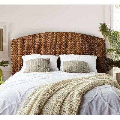 Make a beachy impact in your main or guest bedroom with this eye-catching headboard. Crafted from wicker-woven rattan, it features an arched silhouette with clean lines and a chain-stitch braid design. Natural light and dark brown hues create a dynamic yet neutral look that pairs with any color scheme or coastal aesthetic. Two understated legs raise this headboard to your mattress's level. Best of all, it's designed for easy installation - it comes with pre-drilled holes and is made to mount dir Rattan Panel, Preppy Coastal, Wicker Headboard, Rattan Headboard, Coastal Bedroom, Queen Headboard, Headboard Designs, Wood Headboard, Online Furniture Shopping