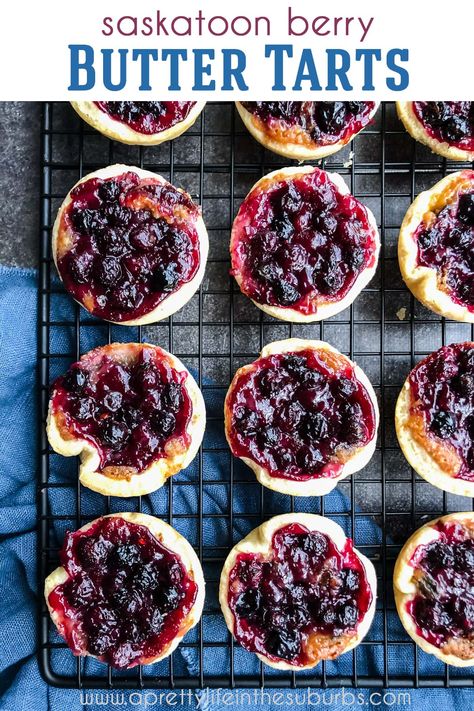 A tray of Saskatoon Berry Butter Tarts Saskatoon Pie Filling, Saskatoon Pie, Saskatoon Berry Recipes, Saskatoon Recipes, Saskatoon Berry Recipe, Saskatoon Berry Pie, Berry Butter, Berry Pie Filling, Berry Pie Recipe