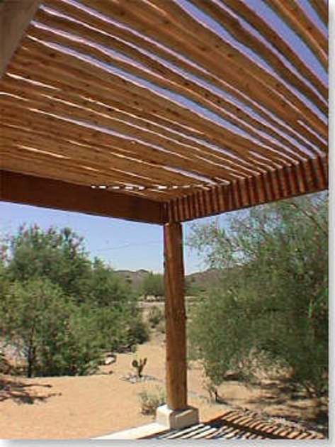 Santa Fe Southwest Patio has Dry Hand Peeled Pine Latillas Sticks for shade Southwest Patio, Southwest Landscaping, Shaded Patio, Patio Installation, Hand Hewn Beams, Steel Pergola, Arizona House, Outdoor Fireplaces, Adobe House