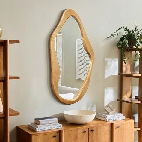 Wade Logan® Brittlynn Solid Wood Asymmetrical Wall Mirror | Wayfair Kitchen Appliance Set, Table Lamps Kitchen, Modern Boho Living Room, Oval Wall Mirror, Nursery Furniture Sets, Mirror Wall Bathroom, Natural Form, Dog Furniture, Cabinets For Sale