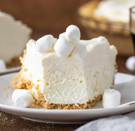 Marshmallow Cream Cheesecake is a glorious cloud-like cream cheese and marshmallow filling topped with magical marshmallow whipped cream! Marshmallow Whipped Cream, Marshmallow Cheesecake, Marshmallow Filling, Spritz Cookie Recipe, Cream Cheesecake, Marshmallow Cream, Spritz Cookies, Marshmallow Fluff, Pies & Tarts