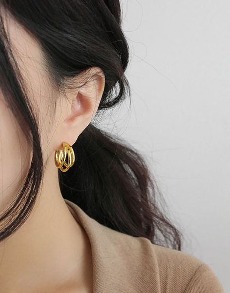 Explore our simple and timeless hoop #earrings made for your daily wear. Our Triple hoops earrings, as its name suggests, features three hollow C-shaped hoops. Minimal and edgy design to upgrade your daily outfit. Hypoallergenic and lightweight, they are handcrafted in gold vermeil and sterling silver. Shop now at www.inxsky.com #inxsky #jewelry #daintyjewelry #simplejewelry #earings #goldearrings #silverearrings #cuteearrings #daintyearrings #hoopearrings #goldhoopearrings #smallhoopearrings Western Gold Earrings, Gold Minimal Earrings, Small Earrings Gold, Triple Hoop Earrings, Gold Earrings Models, Minimal Gold, Simple Hoop Earrings, Edgy Design, Double Hoop Earrings