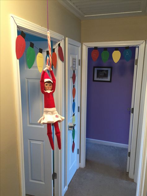 Elf Christmas Lights, Elf On A Shelf Door Decorating Ideas, Elf On The Shelf Wrapped In Lights, Elf On The Shelf Christmas Lights, Elf On The Shelf Christmas Countdown, Elf Countdown To Christmas, Last Day Elf On The Shelf Ideas, Elf On The Shelf Ideas Hanging, Elf On The Shelf Countdown