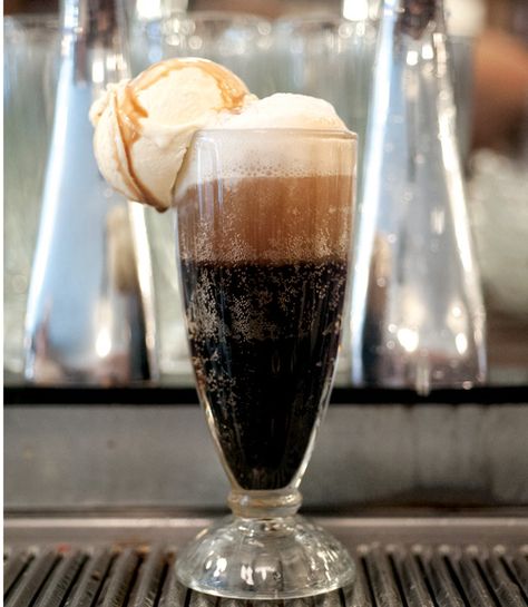 An old time favorite, some folks call this the black-and-white of floats. You can switch it up by reversing the ingredients and using vanilla syrup and chocolate ice cream. Either way, it's a "boop-oop-a-doop" of a float. Recipe: Betty Boop Float   - CountryLiving.com Ice Cream Soda, 50's Diner, Fountain Drink, Vintage Diner, Ice Cream Floats, Diner Recipes, American Diner, Ice Cream Parlor, Soda Fountain