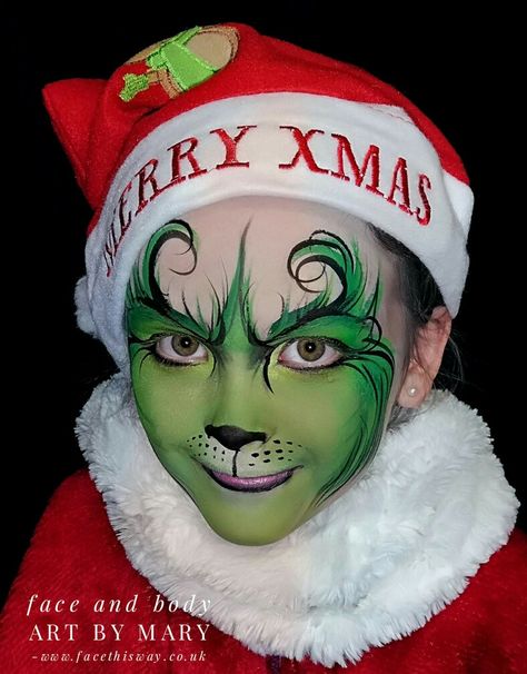 The Grinch Face painting for a boy or a girl Grinch Face Paint Easy, Grinch Makeup Kids, Christmas Face Painting For Kids, Grinch Face Painting, Christmas Face Painting Ideas, Grinch Face Paint, Dog Face Paint, Face Painting For Kids, Face Paint Easy