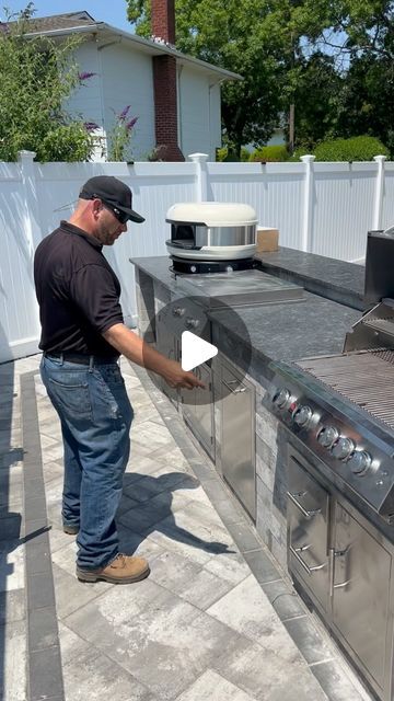 Ageless Masonry on Instagram: "Check out the latest outdoor kitchen !! It’s got everything you could ever want !! Three ways to cook 🥩 🍕! Do you want help with a backyard just like this one ?? .
.
.
#outdoorkitchen #outdoorkitchendesign #outdoorkitchenfabulous #outdoorkitchens #outdoorkitchendesigner #hamptonsfabulous #outdoorkitchensandgrills #outdoorkitchenideas #outdoorcooking #outdoorkitchencabinets #outdoorkitchens_of_insta #outdoorkitchenbuilder #houtoven #outdoorpizzaovens #pizzapartyshop #woodfirepizzaoven #outdoorkitchenbbq #pizzapartyoven #outdoorkitchendesignstore #bestoutdoorkitchen #vedovn #outdoorkitchengoals #landscaperemodel #outdoorliving #fornopizza #mobilewoodfiredpizza #outdooroven #outdoorküche #pizzaovens #pizzapartyovens" Outdoor Covered Bbq Area, Built In Traeger Outdoor Spaces, Bbq Pits Ideas Backyards, Modern Barbecue Design, Blackstone Outdoor Kitchen Ideas, Outside Kitchen Ideas Outdoor Spaces, Cheap Outdoor Kitchen Ideas, Outdoor Barbeque Area, Backyard Kitchen Ideas