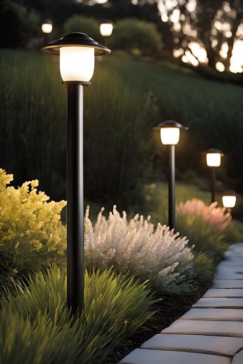 Elegant backyard lighting poles illuminating a garden path, creating a warm and inviting outdoor atmosphere. Light Post Landscaping Ideas, Light Post Landscaping, Backyard Lighting Ideas, Outdoor Pathway Lighting, Landscape Pathway Lighting, Garden Areas, Outdoor Lamp Posts, Post Lighting, Light Pole