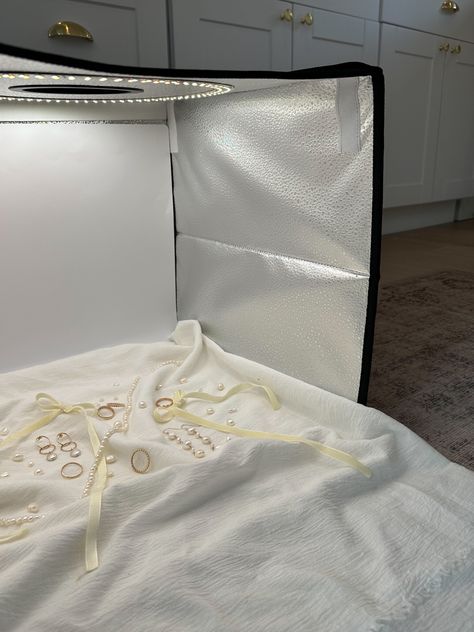 Light box for product photography with handmade jewelry Lightbox Jewelry Photography, Light Box Photography Ideas, Lightbox Photography, Jewel Photography, Portable Photo Studio, Pvc Backdrop, Photo Light Box, Light Box Photography, Photo Studio Lighting