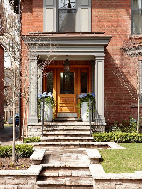 Beautiful hydrangea blooms make your front door very welcoming! More entry ideas: http://www.bhg.com/home-improvement/windows/window-buying-guide/entry-windows-design-ideas/?socsrc=bhgpin061314straightforwardsidelights&page=12 Orange Brick Houses, House Siding Options, Window Design Ideas, Exterior Siding Options, Trim Options, Brick Siding, Interior Window, Siding Options, Orange Brick