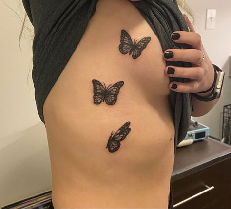 Rib tattoo, butterfly, simple, women rib tattoo Rib Cage Tattoos For Women Butterfly, Butterflies On Side Tattoo, Butterfly On Side Tattoo, 3 Butterfly Tattoo Ribs, Small Butterfly Tattoo On Ribs, Butterflies On Ribs Tattoo, Butterfly Tattoo Side Ribs, Butterfly Ribcage Tattoo, Butterfly Tattoo Rib Cage