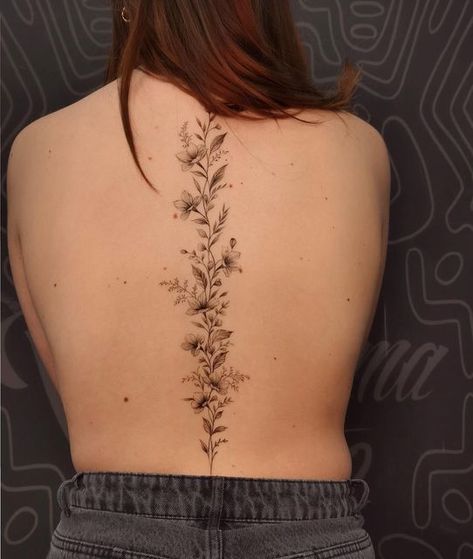 Wild Flower Spine Tattoo, Spine Flower Tattoo For Women, Plant Spine Tattoo, Long Spine Tattoo, Spine Tattoos Unique, Lily Spine Tattoo, Wildflower Spine Tattoo, Floral Spine Tattoos For Women, Simple Spine Tattoo