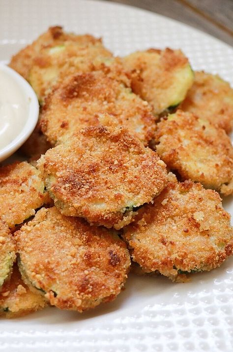 Guilt-Free Air Fryer Ranch Zucchini Chips | "Ranch dressing gives these breaded zucchini chips a zesty flavor. Cooking them in an air fryer gives you the crispiness, but not the guilt, of traditional frying." #airfryer #airfryerrecipes #dinnerideas Ranch Zucchini, Breaded Zucchini, Zucchini Rounds, Zucchini Chips Recipe, How To Cook Zucchini, Ratatouille Recipe, Quick Side Dishes, Zucchini Chips, Air Fry Recipes