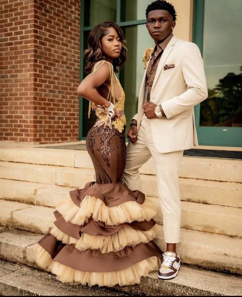 Tan Suit Prom Couple, Brown Tuxedo Prom, Champagne Prom Suits For Men, Beige Prom Suit, Cream Prom Dress Couple, Brown Prom Suits For Black Men, Brown Prom Suit, Beige Prom Couple, Tan Prom Dress With Date