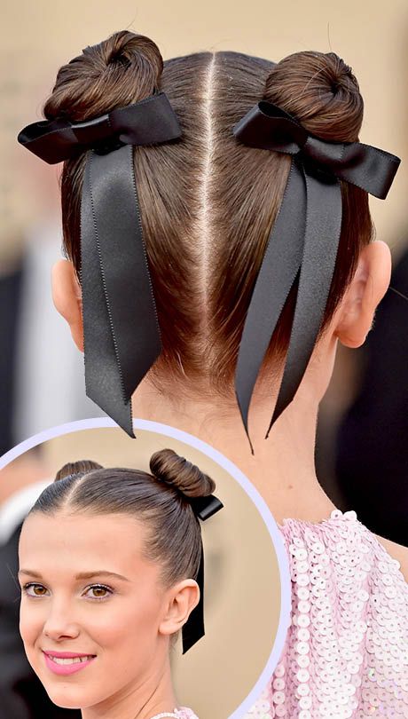 Millie Bobby Brown: Ribbon adorned space buns! We worship at the style altar of M.B.B. If that weren’t enough, she also rocked glittery lids with this. Ribbon Space Buns, Space Buns With Ribbons, Two Bun Hairstyles, Space Bun Hairstyle, 2 Buns Hairstyle, 2 Buns, Space Buns Hair, Two Buns Hairstyle, Space Bun