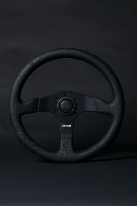 A MOMO steering wheel of ours Steering Wheels Jdm, Wood Steering Wheel, Momo Steering Wheel, Racing Steering Wheel, Steering Wheel Aesthetic, Quick Release Steering Wheel, Custom Steering Wheel, Bmw E21, Vw Mk1