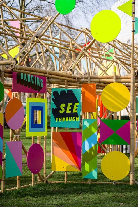 New London Fabulous designer Morag Myerscough has built a bamboo pop-up pavilion decked in colourful flags and posters in London’s Grosvenor Square. See Through Pavilion straddles a path through the leafy public park and is a cheerful intervention for the pandemic age. Photo: Gareth Gardner #london #art #installation #park #design Bamboo Installation, Bamboo Pavilion, Grosvenor Square, Graphic Panels, Bamboo Structure, Outdoor Event, Festival Design, Positive Messages, Stage Design