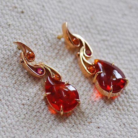 Fire Opal earrings handmade by Ricardo Basta Fine Jewelry | fire earrings, handmade earrings Fire Jewelry Design, Fire Jewelry Ring, Dragons Breath Fire Opal Jewelry, Fire Earrings, Blue Fire Opal Earrings, Fire Jewelry, Fire Opals, Fire Opal Earrings, Sparkly Jewelry