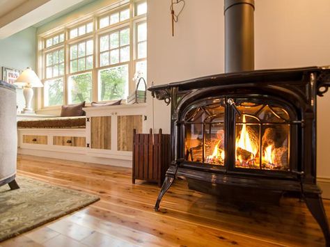 Stove Window, Outdoor Wood Furnace, Corner Stove, Vermont Castings, Built In Window Seat, Cabin Diy, Cabin Living Room, Wood Stove Fireplace, Stove Fan