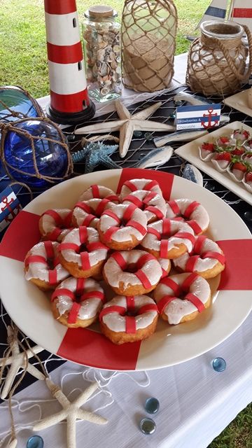 Lifesaver Doughnuts Titanic Birthday Party, Sharknado Party, Yacht Rock Party, Titanic Birthday, Titanic Party, Beach Ball Cake, Vbs Snacks, Sailor Party, Jaws Shark