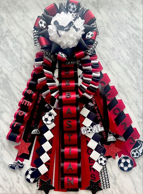 Soccer themed boys homecoming garter mum Mum For Boys Homecoming, Homecoming Mum Themes, Boy Homecoming Mum, Guy Mums Homecoming, Soccer Garter Homecoming, Boys Homecoming Mum Garter, Soccer Mums Homecoming, Boys Mums Homecoming, Boy Mums Homecoming