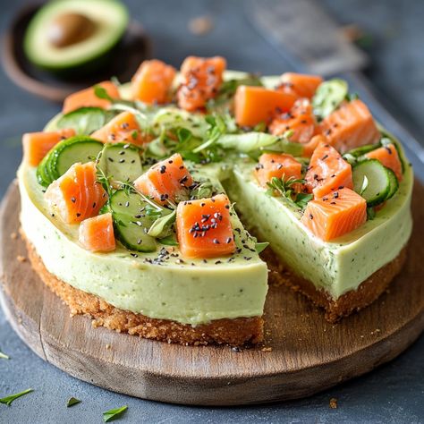 🍰 Savory Avocado & Salmon Cheesecake 🥑 🕒 Preparation Time: 20 minutes 🍽️ Chilling Time: 2 hours 🍴 Servings: 6-8 Ingredients: For the Crust: 150g whole wheat crackers or breadsticks, crushed 75g unsalted butter, melted For the Cheesecake Filling: 200g cream cheese, softened 2 ripe avocados, peeled and pitted 100g sour cream Juice of 1 lime 1 tbsp fresh dill, chopped Salt and pepper to taste For the Topping: 200g fresh salmon fillet, cubed (sushi-grade if raw) 1 small cucumber, thinly sliced ... Salmon Cheesecake, Avocado Cheesecake, Whole Wheat Crackers, Wheat Crackers, Salmon Fillet, Fresh Salmon, Small Cucumber, Salmon Avocado, Cheesecake Filling