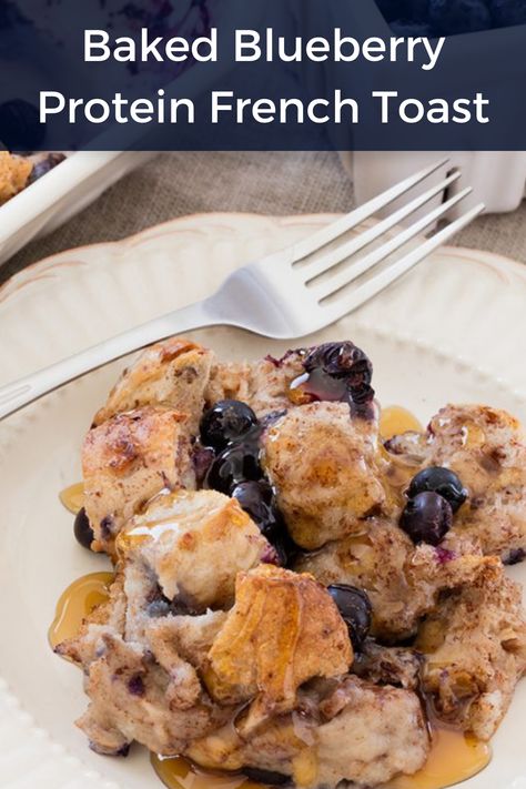 A healthy breakfast, protein powder recipe featuring a french toast casserole covered in syrup and blueberries. French Toast With Protein Powder, Healthy Sweet Breakfast Casserole, Healthy Breakfast Crockpot, Macro Friendly French Toast Casserole, Blueberry Protein Powder Recipes, Protein French Toast Meal Prep, Protein Breakfast Recipes On The Go, High Protein Meals Lunch Ideas, French Toast Recipe Protein