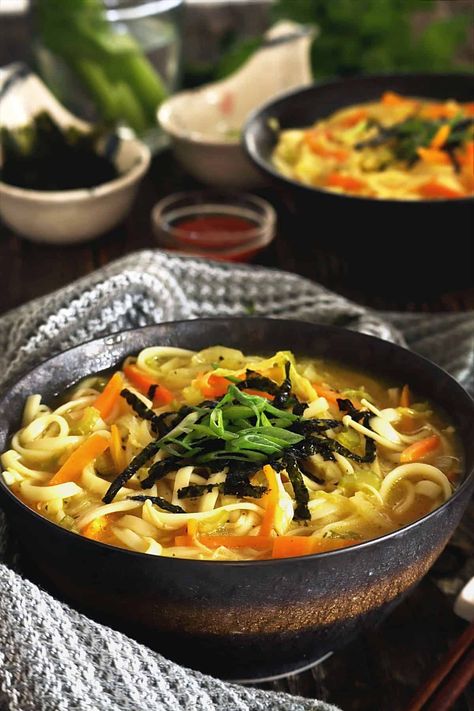 This Spicy Udon Noodle Soup is a quick and simple Japanese-style comfort food made with thick and chewy udon noodles and loads of veggies in a spicy and well-seasoned broth. Topped with green onions and nori flakes to amp that umami flavor up a notch! Chicken Udon Noodle Recipe, Udon Noodle Recipe Soup, Udon Noodle Recipe, Soup Japanese, Chicken Udon, Udon Noodle Soup, Udon Noodle, Recipe Soup, Noodle Recipe