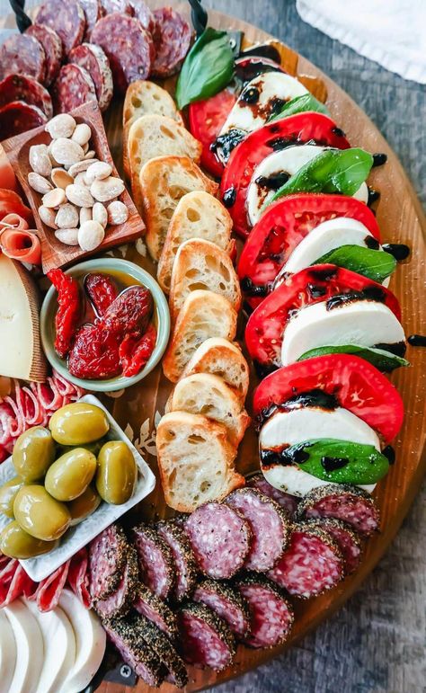 Italian Charcuterie Board. A beautiful Italian Charcuterie board filled with Italian meats and cheeses and paired with sauces, fruits, and vegetables. Perfect to pair with your Italian meal. #UltimateButterMaking Italian Charcuterie Board, Italian Charcuterie, Italian Meats, Catering Ideas Food, Italian Appetizers, Charcuterie Recipes, Finger Food Appetizers, Meat And Cheese, Moist Cakes