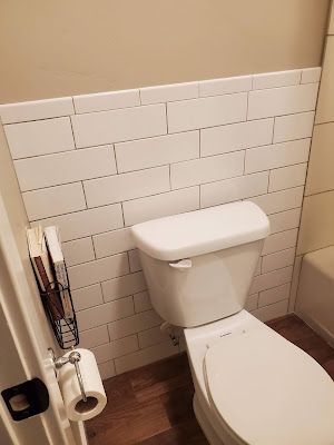 Behind Toilet Wall Ideas, Tiling Behind Toilet, Tile Behind Toilet, Behind Toilet, How To Tile, House Renos, How To Lay Tile, Wide Dresser, Round Tiles