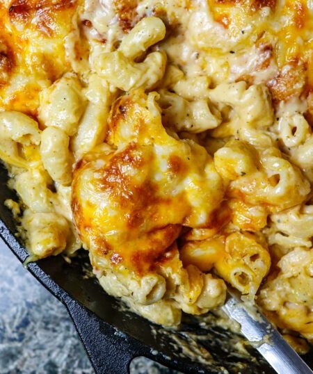 Skillet Mac & Cheese - Tony Chachere's Cast Iron Skillet Mac And Cheese, Skillet Mac And Cheese, Smoked Turkey Legs, Elbow Pasta, Condensed Soup, Skillet Dishes, Holiday Side Dish, Holidays Recipes, Cheese Cubes