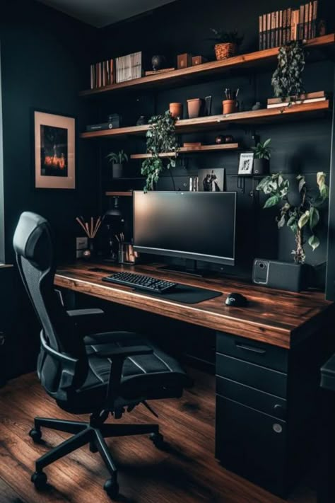 A Dark Moody Small Home Office featuring a sleek, minimalist desk setup with wooden shelves, plants, and warm lighting embodies the essence of Dark Scandinavian Minimalism, perfect for those seeking Moody Office Ideas for a Dark Modern Office or a Home Office Dark design. Desk With Accent Wall, Dark Minimalism Interior, Moody Academia Office, Modern Dark Room, Dark Office Interior Design, Black And Wood Desk, Office Design Ideas Workspaces, Black Office Ideas, Home Office Dark Wood