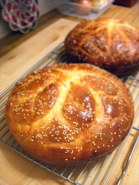 Vasilopita- A sweet, orangey, delicious bread traditionally served on New Year's day. A coin is hidden inside and whoever gets it has good luck for the year. Greek Bread, Baked Breads, Greek Sweets, Greek Desserts, Greek Cooking, New Year's Food, Greek Dishes, Bread Bowls, Delicious Bread